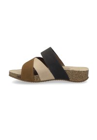 Brown, beige, and black leather slide sandal with cross-strap design and cork sole. Textured footbed and rubber outsole for grip.