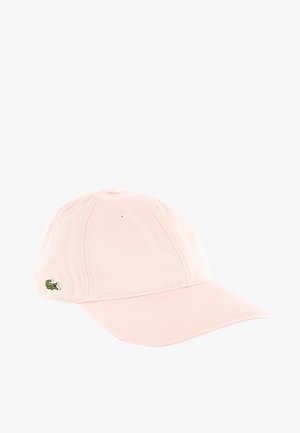 Cappellino da baseball rosa chiaro con visiera curva e piccolo logo di coccodrillo verde sul lato, su sfondo bianco.