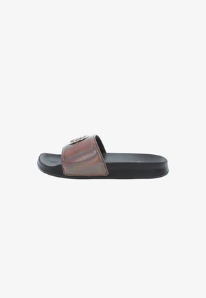 Slide sandal with a black textured sole. The strap features an iridescent sheen and a circular logo accent. Lightweight and open design.