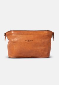 Brown leather pouch with a zip closure, featuring a smooth texture, rounded shape, and embossed "HOLZRICHTER BERLIN" logo.