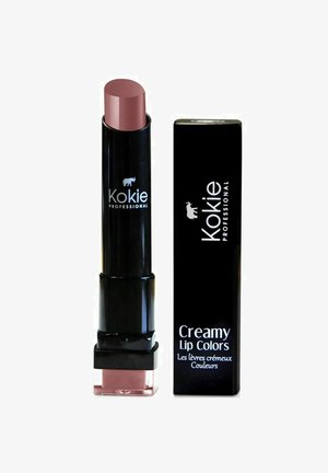Kokie Professional kreminis lūpų atspalvis juodame plastiko vamzdelyje su apvaliu viršumi, turintis šviesiai mauvinį atspalvį ir skaidrų pagrindą. Pakuotėje matomas produkto pavadinimas.