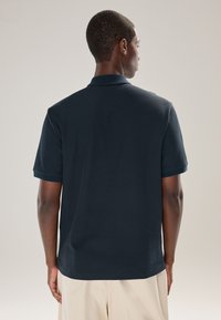 Next REGULAR FIT - TEXTURED ZIP NECK  - Poloshirt - navy blue