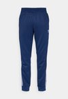 ADICOLOR CLASSICS SUPERSTAR TRACK PANTS - Donji dijelovi trenirke - night indigo