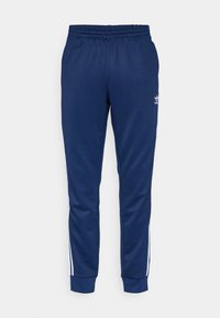 ADICOLOR CLASSICS SUPERSTAR TRACK PANTS - Donji dijelovi trenirke - night indigo