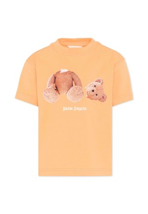 Pomarańczowy T-shirt z krótkim rękawem, z grafiką odciętego misia pluszowego i napisem "Palm Angels" poniżej.