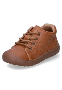 Brown leather shoe with a low profile, rounded toe, six eyelets, and rubber sole featuring a textured pattern. Accented with stitched detailing.