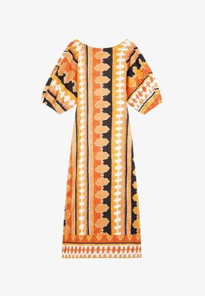 Maxi dress featuring an orange, black, and white geometric pattern. Puff sleeves, round neckline, and a straight silhouette.