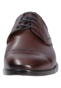 Brown leather dress shoe with rounded toe, dark laces, and smooth finish. Features subtle stitching and a low black sole for stability.