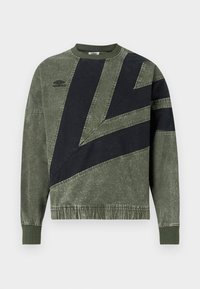 Hosszú ujjú, zöld és fekete színblokkolt pulóver, bordás mandzsettákkal és gallérral, a bal mellen az Umbro logójával.
