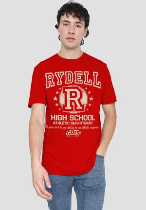 Red short-sleeve t-shirt featuring "RYDELL HIGH SCHOOL ATHLETIC DEPARTMENT" printed in white, with a circular logo and tagline at the bottom.