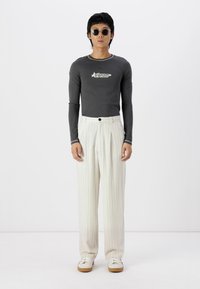 YOURTURN UNISEX - Pantalon classique - off white