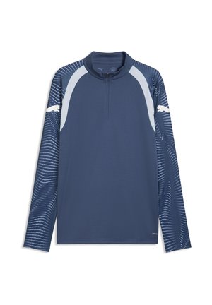 Camiseta deportiva azul marino de manga larga con mangas blancas estampadas, cuello con cremallera de un cuarto y logotipos blancos de Puma en cada manga superior.