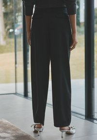 Next Nohavice - black