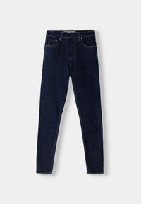 Mörkblå denimjeans med smal passform, försedda med fem fickor, knappstängning och kopparstickningar. Slät textur och klassisk design.