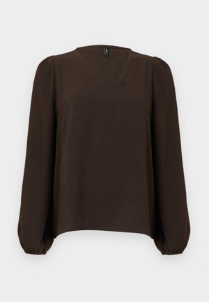 Blouse marron foncé avec col en V, manches longues bouffantes resserrées aux poignets, et une coupe légèrement ample.