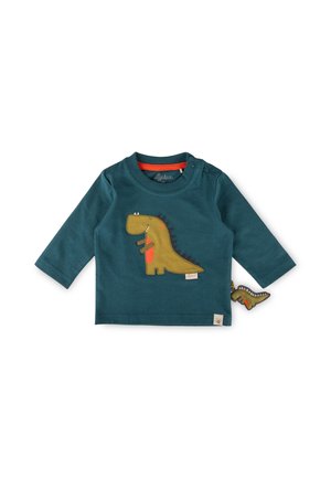 Dunkel-tealfarbenes Baby-Langarmshirt mit einer lächelnden Dinosauriergrafik und einem weichen Dinosaurier-Schwanz, der seitlich befestigt ist.