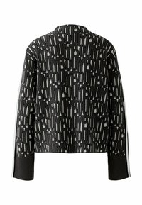 Zwart en grijs gebreide trui met een geometrisch patroon, voorzien van lange mouwen en witte zijstrepen, ontworpen met een cropped snit.