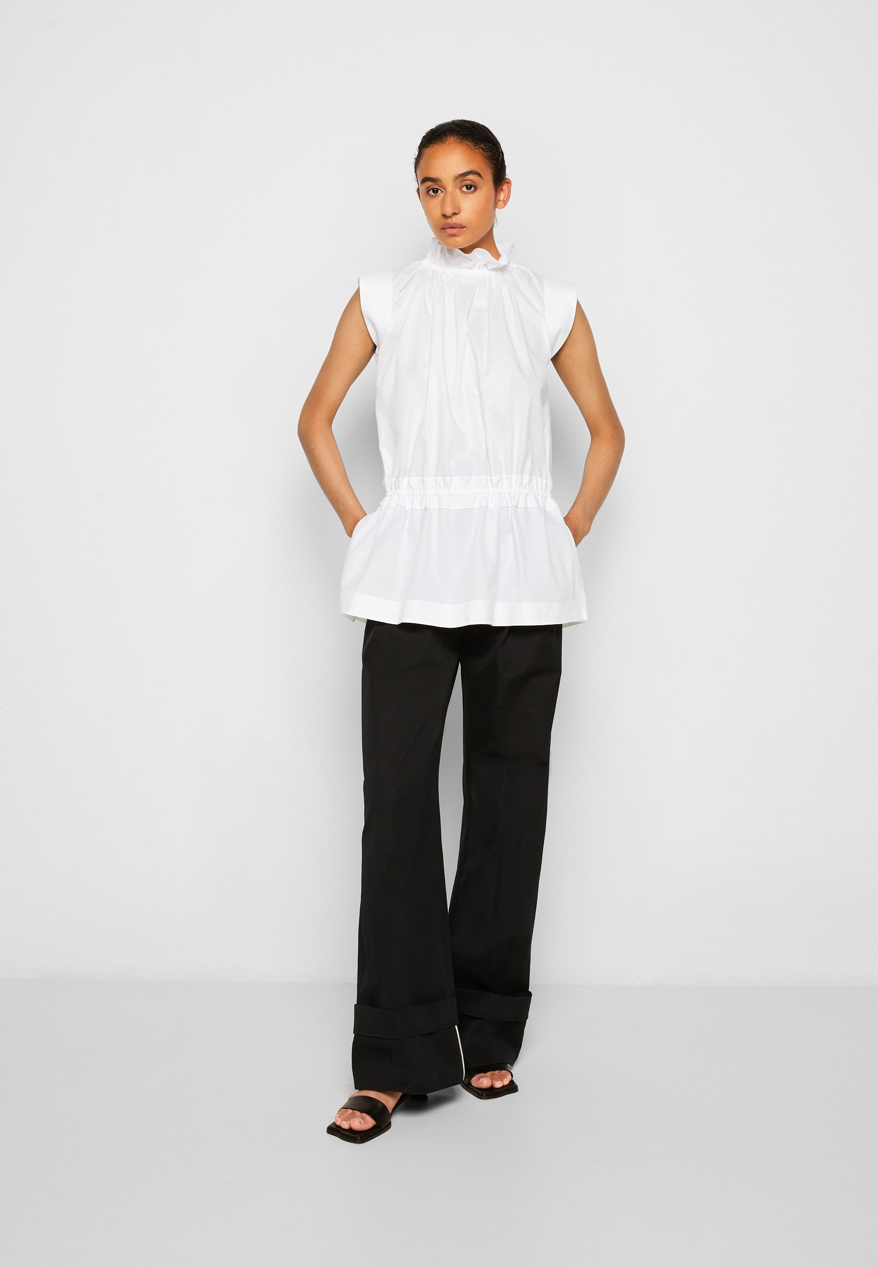 Women SLEEVELESS RUFFLE NECK - Blouse Women SLEEVELESS RUFFLE NECK - Blouse