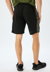 Koton SPORT  - Verryttelyhousut - black