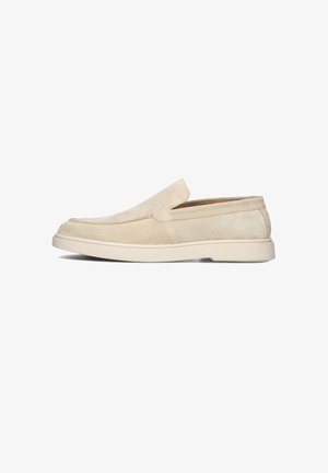 Beige Wildleder Slipper mit einem minimalistischen Design, das eine glatte Textur und eine dicke weiße Gummisohle für Komfort bietet.