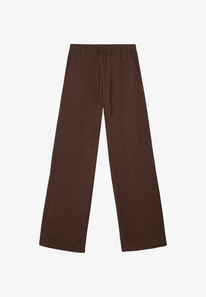 Hnedé nohavice s širokými nohavicami, s elastickým pásom a nastaviteľnou sťahovacou šnúrkou, vyrobené z ľahkej látky.