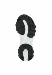 Schwarze und weiße Sneaker-Sohle mit einer strukturierten Gummisohle und tiefen Rillen für Traktion sowie einer ergonomischen Form.