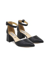 Décolleté neri con tacco largo, design a punta, cinturino alla caviglia con fibbia tonda e texture in pelle liscia. Soletta interna a contrasto.