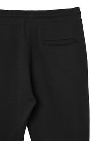 Schwarze Jogginghose mit elastischem Bund, glatter Textur und einer einzelnen Gesäßtasche mit dezentem gesticktem Rand.