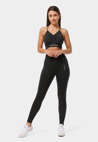 Carpatree ALLURE SEAMLESS  - Neliela atbalsta sporta krūšturis - metallic black
