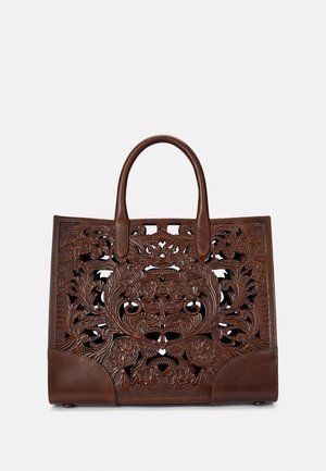 Braune Ledertragetasche mit filigranen ausgestanzten Blumenmotiven, glatten Griffen und festem Boden für Stabilität.