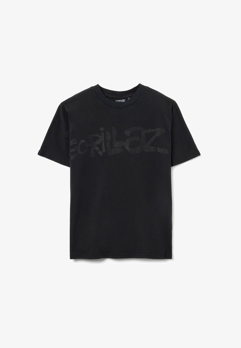 Black cotton t-shirt featuring a large, semi-transparent "Gorillaz" logo in front. Standard crew neck and short sleeves, smooth texture.