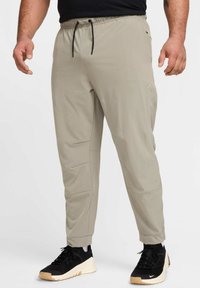 Nike Performance - UNLIMITED  - Pantalon de survêtement - light army black light army Image miniature 1