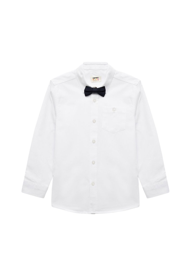 Hvid langærmet skjorte med knap-ned krave, prydet med en sort butterfly og en brystlomme. Cotton stof med en glat tekstur.