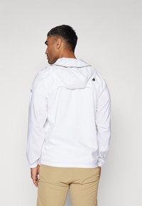 The North Face MOUNTAIN ATHLETICS HOODED WIND JACKET - Vindjacka - white
