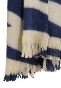 Manta de mezcla de lana con rayas alternas en azul marino y crema, con bordes con flecos para aportar textura y detalle.