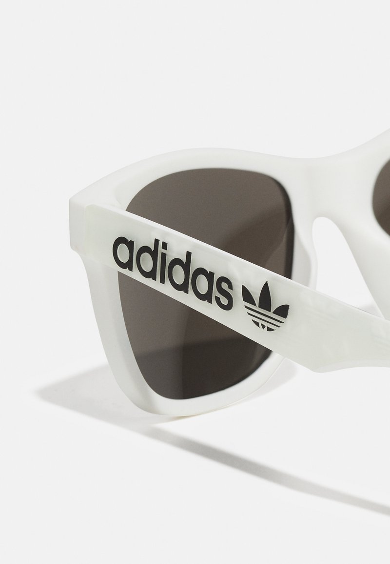white adidas sunglasses