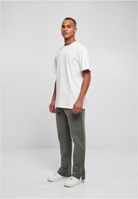 Urban Classics SLIT - Pantalon de survêtement - darkshadow