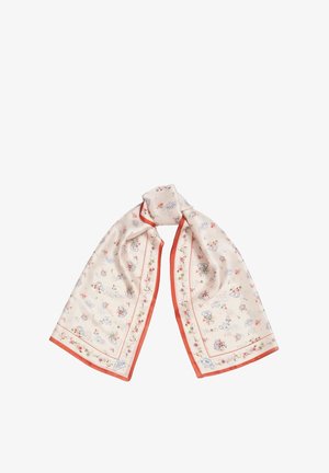 Écharpe en soie crème avec petits motifs floraux et tasses à thé, bordée d’un orange doux, nouée lâchement en haut.