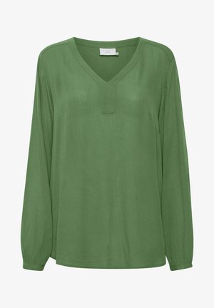 Green long-sleeve blouse with a V-neck, made from a smooth fabric. Features a center seam and subtle texture, with elastic cuffs.