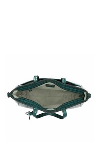 Sac fourre-tout en cuir vert à motif crocodile avec un intérieur en tissu beige, fermeture éclair ouverte et deux poignées, vu du dessus.