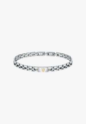 Silberner Metallarmreif mit miteinander verbundenen Gliedern, versehen mit einem zentralen goldenen Akzent und einem Logo. Glatte Textur und polierte Oberfläche.