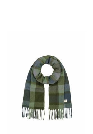 Wool plaid scarf in shades of green, blue, and gray with fringed ends, folded in a circular loop.