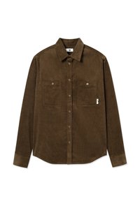 Ruskea corduroy-paita, jossa on pitkät hihat, kaksi rintataskua, napitettava etuosa ja hieman kaareva helma. Pysyy hillitty ribbitekstuuri.