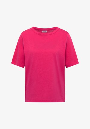 Jasnoróżowa koszulka z krótkim rękawem, o okrągłym dekolcie, z metką "Cecil" wszytą przy kołnierzu.