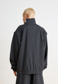 adidas Originals ZIP OFF - Treniņjaka - black