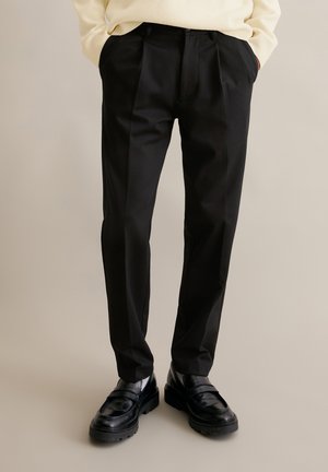 INTERLOCK - Chinos - black