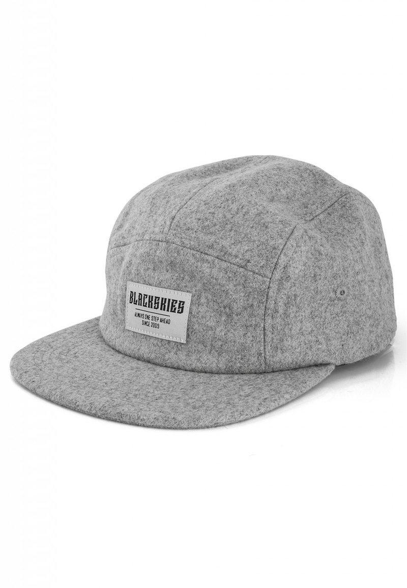 Gray, wool blend cap with a flat brim, featuring a logo tag on the front. Simple, structured design with a textured finish.