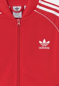 adidas Originals SST - Träningsjacka - vivid red/white