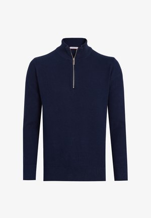 Marineblå strikket pullover med lynlåslukning ved kraven, med et tekstureret mønster og ribkanter ved ærmer og kant for et tætsiddende look.