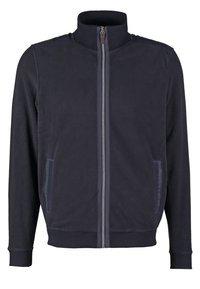 Giacca in pile blu navy con zip, colletto, polsini, vita a costine e due tasche laterali verticali con zip.